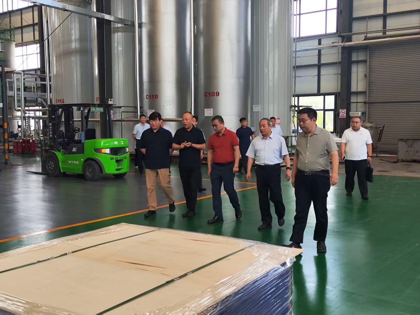 Delegation crosses the tank farm production area
